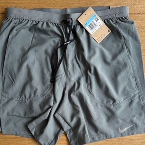 Men's Nike Grey Shorts with Drawstring and liner 7” length Medium.